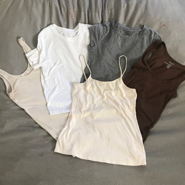 A collection of tshirts can easily be mixed and matched with a minimalist wardrobe. #minimalistwardrobe #minimalistlifestyle