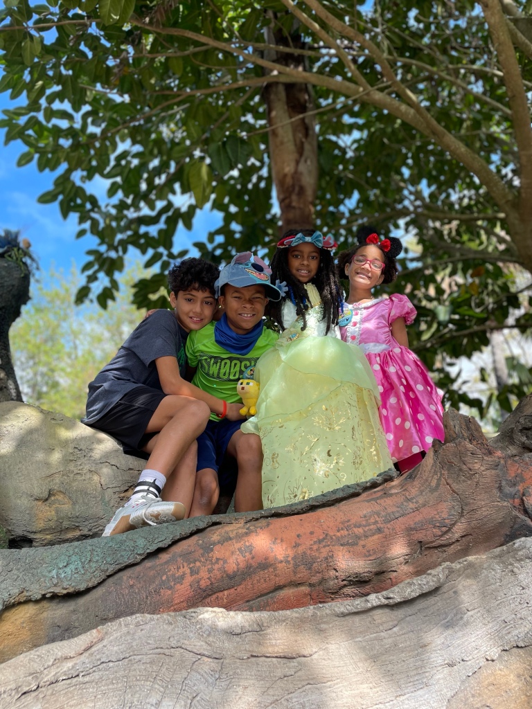 Disney World Photo taken in a tree at Animal Kingdom | ordinarilyextraordinarymom #disneyworldphotos #disneyphotos #disneyphotospots #disneyphotoideas #disneyphotoideaskids